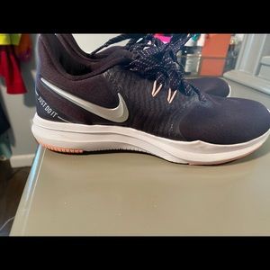 Woman’s plum color Nike running sneakers size 6.5